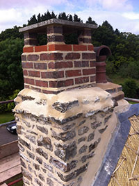 Private House re-pointing of this chimney including after removal of cement.
